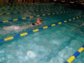  Isabel Schwartz swims the 200 yard freestyle. (Credit: Trevor Dixson)