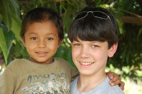 yler Kim, a freshman at WHS, with an orphan in Nicaragua.