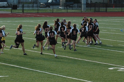 The girls varsity lacrosse team celebrates their playoff win against 8th seed on Wednesday. (credit: The Barber Family)
