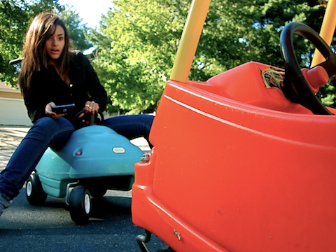 Sophomore Aurora Burgos tries to avoid collision while texting behind the wheel. (Photo Illustration: Lizzy Worstell/WSPN)