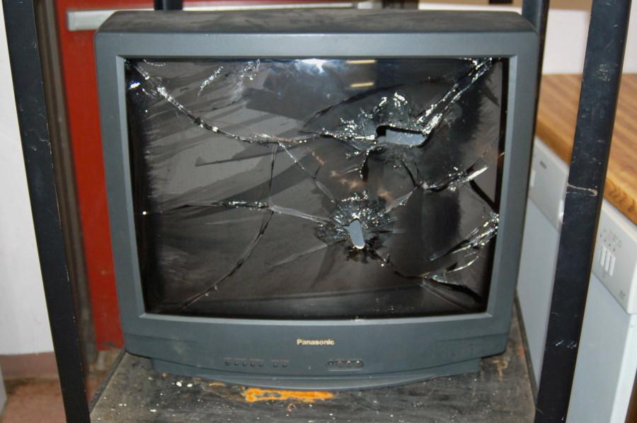 A broken and smashed television damaged from the vandalism at Camp Arrowhead. (Credit: Natick Police Dept.)