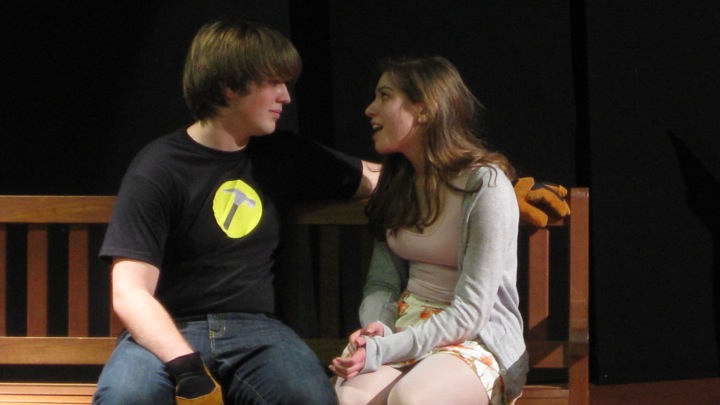 Alex Dulude (left) as Captain Hammer and Julia Terranova (right) as Penny in Dr. Horribles Sing-Along Blog share a sweet moment. (Credit: Marissa Daftary/WSPN)