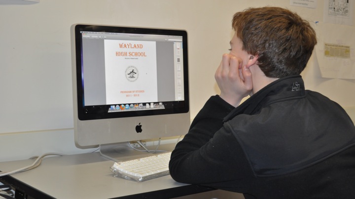 Students have begun to comb through the updated Program of Studies to choose their courses for next year. (Photo Illustration: Jackson Hubbell/WSPN)