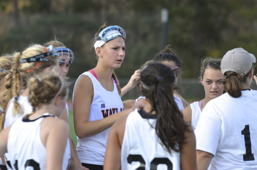 WHSs field hockey team remembered Jim Griffin by paying a benefit game to raise money for the Jim Griffin Family Support Trust. During the game, the players wore special white and purple jerseys with the letters JG to commemorate Griffin.
