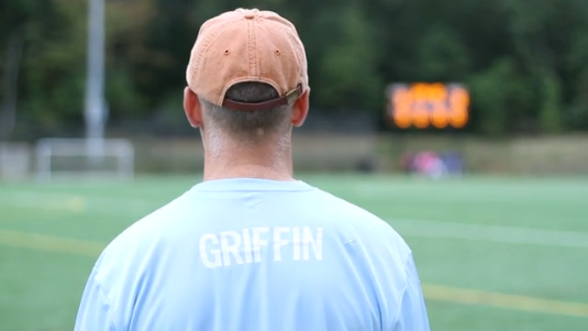 During the boys soccer teams Kicks for Cancer charity fundraiser game, each of the team members put the name of someone who they knew who had fought cancer on the back of their shirts.