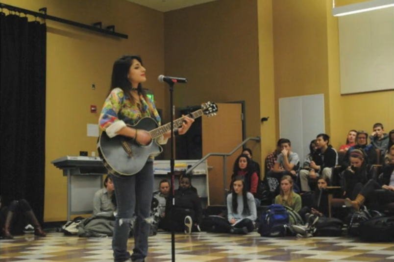 Above, Roxi Habibi performs during this years Winter Week. Habibi loves music and art and hopes to pursue her passion for the rest of her life.