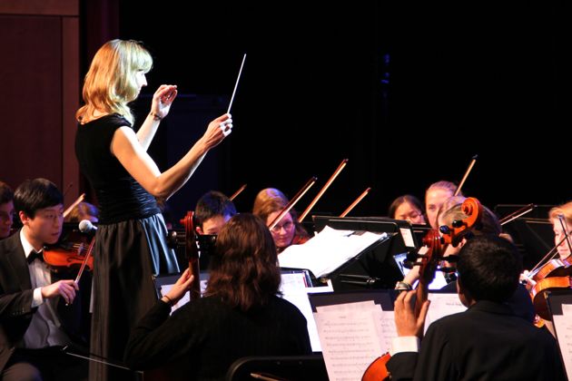WPS Fine Arts Director Susan Memoli leads the WHS Orchestra in a past concert.