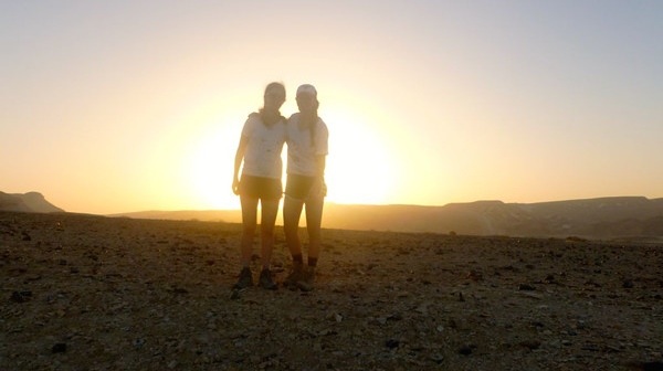 Above, Sheffres poses in front of a desert sunset in Israel. Sheffres visited Israel for a month over the summer. “It just gave me a different perspective of the world, Sheffres said.