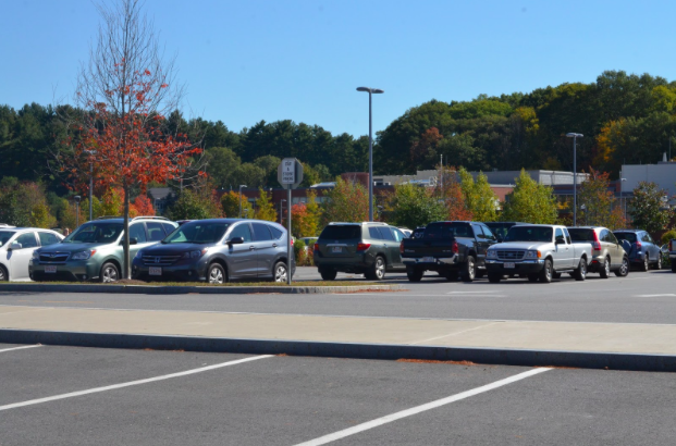 Above is the parking lot. This year the junior and senior parking lots have been combined. “We waited four years to park in the front row and now seniors are being forced to park in the back rows or the junior lot because the underclassmen are taking their spots,” senior Zack Ross said.