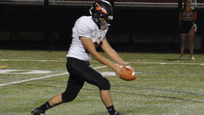 Pictured above is junior Tony Park punting in Waylands playoff game vs. Melrose. Park is the punter for the Wayland Football team.  You practice so much for it that you have to take the chances you get and do your best,” Park said.