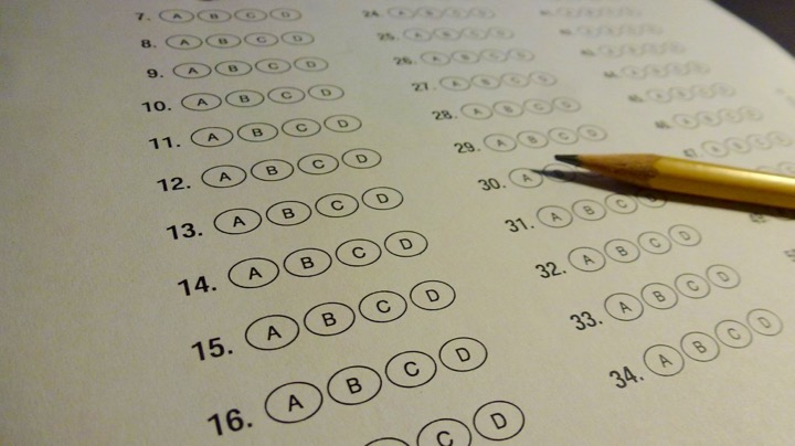 Shown above is a standardized test answer sheet and pencil. The Massachusetts Board of Education voted on November 23 to reject Common Core standards and to design a different test.  “I think [Common Core] is good since the entire country can compare results and then target areas that are not doing as well as others,” freshman Spencer Lee said.