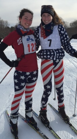 Above is Varnau (right) with fellow ski team co-captain Lorenc. 