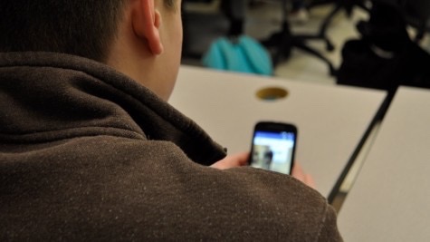 Above is a student using his phone. Seniors set all of their phone alarms for 10 a.m. on May 24 as a senior prank. 
“If you want to play that game, there’s going to be some kind of consequence,”  Assistant Principal Scott Parseghian said.