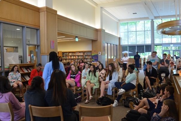 Above, students participate in Tuesdays discussion panel in the WHS media center. Led by senior William Paik, students came together to talk about race, culture, religion, and the importance of all three in the WHS community. 