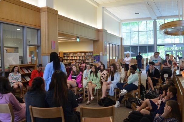 Above, students participate in Tuesday's discussion panel in the WHS media center. Led by senior William Paik, students came together to talk about race, culture, religion, and the importance of all three in the WHS community. 