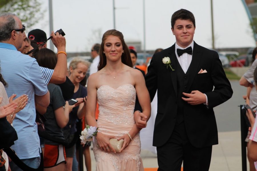 Pictured above are two students walking down the orange carpet at pre-prom. WSPN interviewed Instagram user @waylandpromposals to learn more about why they created their account.
