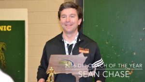 Pictured above is Wayalnd Wrestling head coach Sean Chase holding the 2015-2016 MIAA Division 3 State Championship trophy. 