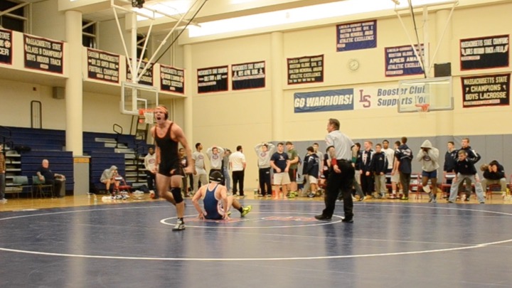 Pictured above is Wayland senior Ben Jones after coming up with the match-winning pin against Lincoln-Sudbury. 