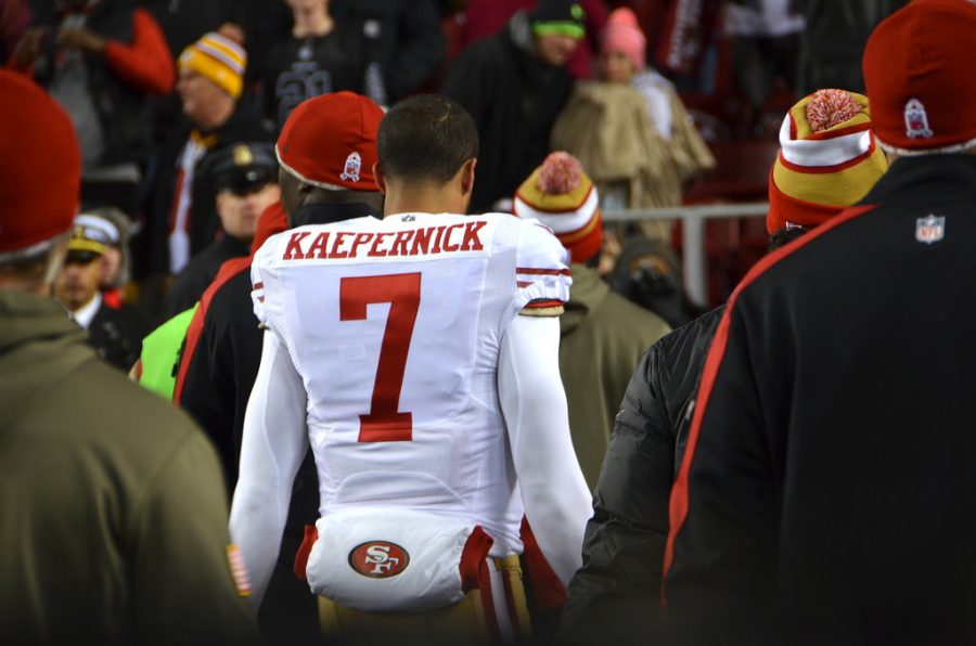 photo credit: flickr user Adam Fagen

Pictured above is Colin Kaepernick quarter back of the San Francisco 49ers. Audrey Camacho writes, "Kaepernick is taking the wrong steps to gain attention from media about the current problems between police and people of color."
