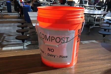 Above is a compost bucket in the Commons. WHS' Green Team recently introduced these stations to lunches. "“It’s something everyone can do so easily, and we can help our environment at the same time. What else can you ask for?” said senior Callie Junkin.