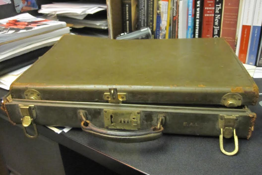 Above is a briefcase containing artwork which Wellesley resident Deb Merkin found in the middle of a Wayland street. History teacher Kevin Delaney and his Attic Archaeology class have been researching the briefcase this winter.