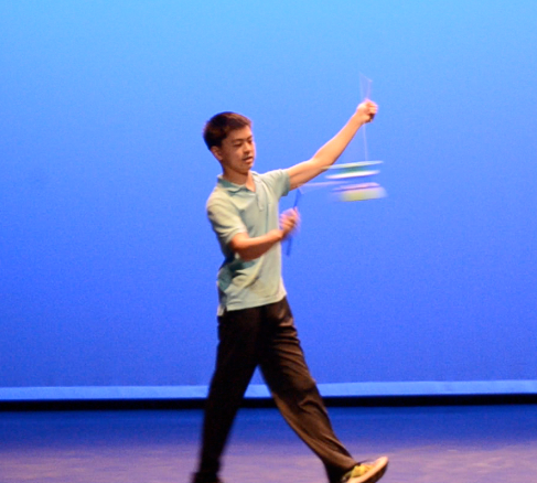 Wang performs the Excalibur trick at the 2017 Winter Week Talent Show. The trick involves swinging the yo-yo horizontally. 