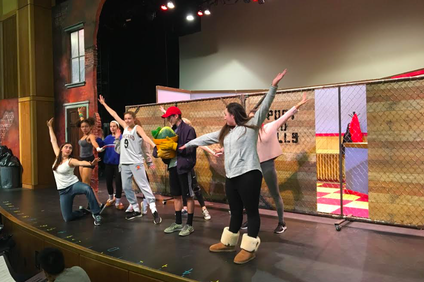 The cast members of WHSTE’s “Little Shop of Horrors” work hard in rehearsal to prepare for their performance.