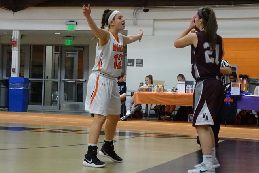Freshman Lilly Stoller guarding a Westford player.