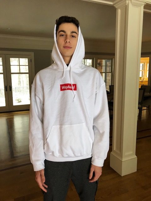 Pictured above is freshman James Waldron wearing his sweatshirt designed by Long.