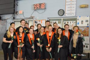 The Swim and Dive Team faces Norwell during Senior Night