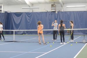 Girls’ varsity tennis team swings into new season (video)
