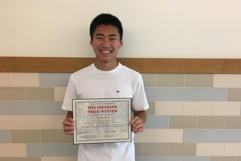 Pictured+above+is+sophomore+Kyle+Chen+and+his+Freedom+Prize+plaque.+Kyle+won+the+13th+annual+Freedom+Prize+Paper+contest.+%E2%80%9CI+think+that+writing+something+that+%5Bcan%5D+have+a+profound+effect+on+my+community%2C+%5Band%5D+that+people+will+actually+read+and+think+about+has+been+an+experience+that+has+helped+me+grow+and+find+my+voice%2C%E2%80%9D+Chen+said.+