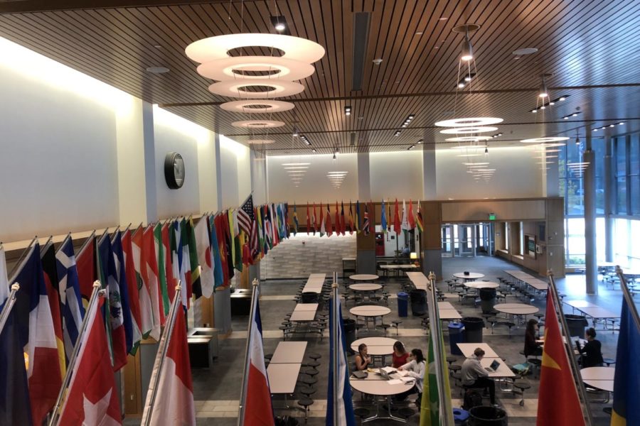 Flags of different countries across the world line the walls of the WHS commons. The flags were installed in the commons this past summer. There was a really careful effort made to ensure that each flag was hung correctly so that it’s not upside down or sideways, Principal Allyson Mizoguchi said.