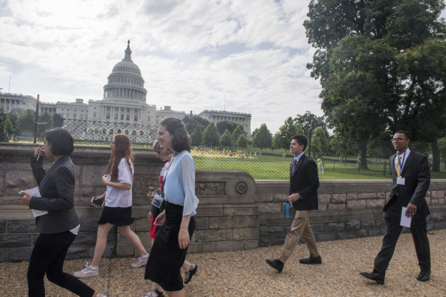 Massachusetts representative Nathan Zhao walks to the US Capitol alongside the representatives from (left to right) Nevada, Utah, Michigan, and Mississippi.