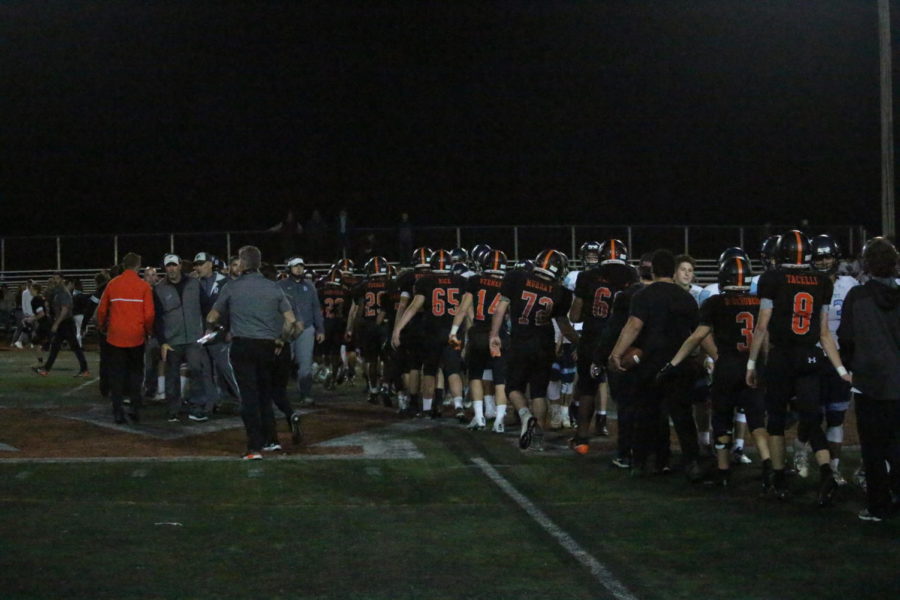 Wayland lines up to shake hands with Dracut after the game.