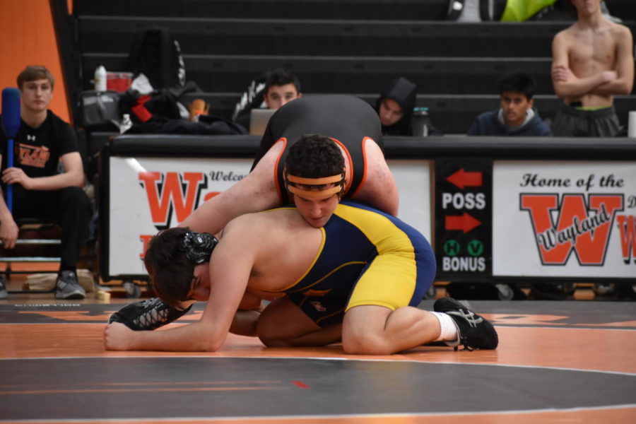 Murray flips his Lexington opponent. “It is still quite early in the year, so we are still not 100 percent sure who the starting varsity wrestlers are going to be. There are a few weight classes where we lack athletes, and it can be difficult for some wrestlers to make weight. This is why our lineup was not what we expected it to be, but it did make for a very exciting match against Holliston,” Murray said.
