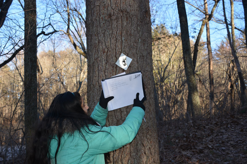 Junior Rohini Ramesh works on her Silver Award, which consists of putting signs up on trees. Ramesh has been doing Girl Scouts for seven years, helping around the community of Wayland. It’s important to help the community because you are helping people who don’t have as much as you and it’s important to realize that, Ramesh said. It makes me feel grateful for everything I have.