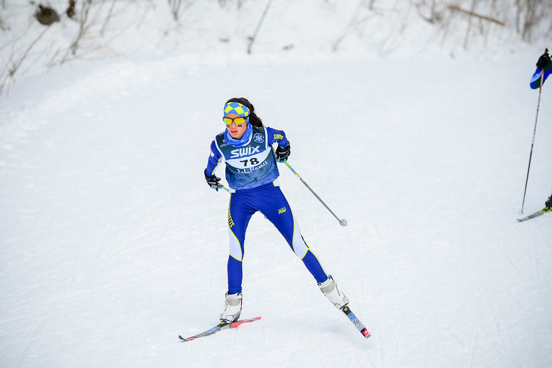 Sophomore Tali Wong finishes a race at the Eastern High School championships. Wong has been competitively Nordic skiing since the third grade. The races end up being around 5 miles, so you have to be able to race and go fast for an extended period of time which is really hard, Wong said.