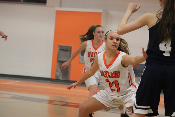 Junior Abi Macdonald defends against an opposing player. MacDonald started her basketball career in first grade and is now a two-year veteran of the girls varsity basketball team. I enjoy basketball because of the intensity and physicality of the game, MacDonald said.