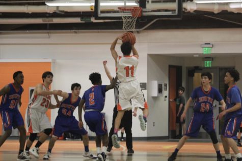 Boys basketball scores a win against Newton South (12 photos)