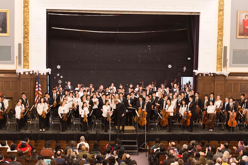 Pictured above is the 2018 Massachusetts Eastern Senior District Orchestra. Senior Rachel Chau shakes the conductors hand at the end of the concert, in which she served as concertmaster. “I love to play because music is kind of a universal language, and [one] that everyone can understand and pick up on. [Also], you can communicate different ideas and messages through sound,” Chau said.