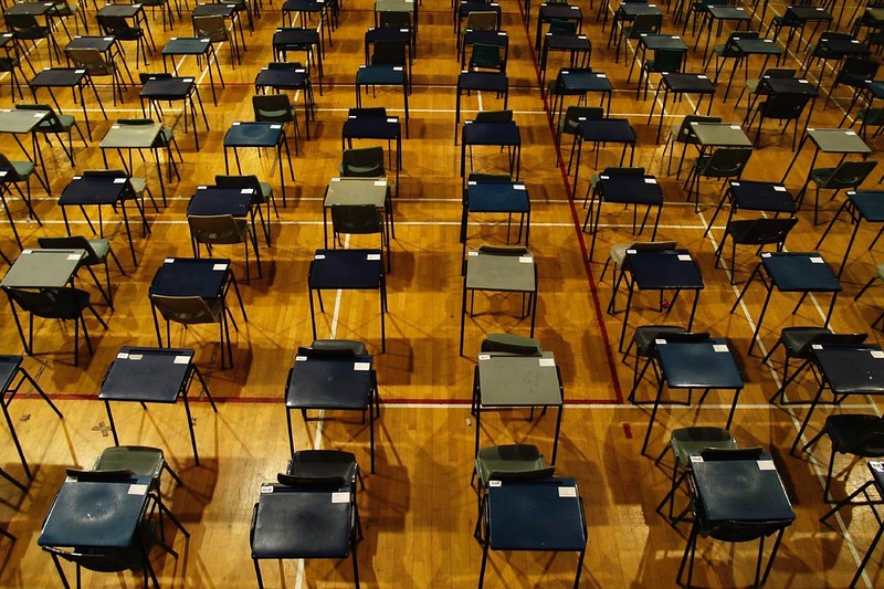 Pictured above is a setup for a typical SAT or SAT Subject Test. The College Board, a nonprofit which offers college entrance exams such as these, has been under scrutiny for compensating its CEO with a very high salary and charging high fees to students and their families for its services.