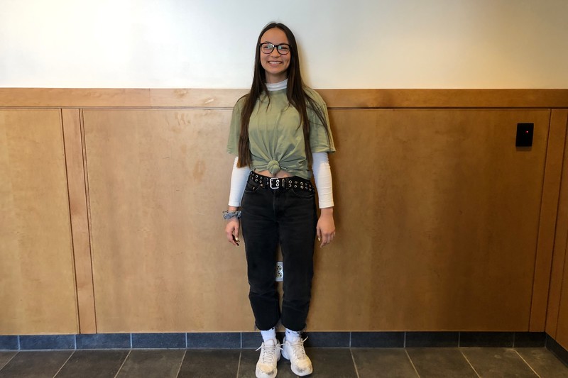 Junior Ava Tang dresses in New Balance, Levis and thrifted clothing. Tangs favorite piece of clothing to dress in are sweaters. I think there [are] a lot of different patterns you can find or different bright colors with different fabrics and stuff,” Tang said