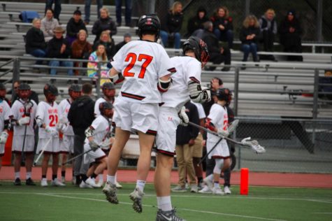 Boys varsity lacrosse defeats North Attleboro (15 photos)
