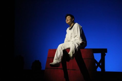 Sophomore Kaiyang Zhang playing Snoopy in the WHSTE fall play, Youre a Good Man, Charlie Brown. Zhang has been acting for around four years and has been a part of many different plays. Everything gives you a new feeling and a new expression, Zhang said. Acting gives me this new perspective on different subjects and matters because of how they are portrayed through the writing and the acting.