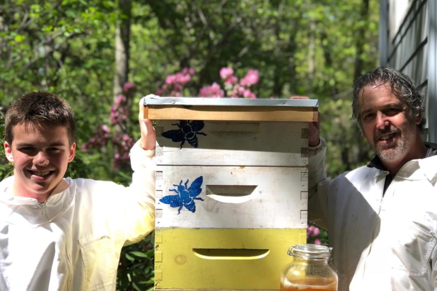 WHS junior Jay Provost, along with his father Bob Provost. “I think it’s super calming, and it’s nice to just go and look at the bees to see how well organized they are,” Jay Provost said.