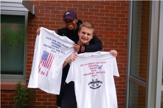 Student council president, Shawn Bernier, and Vice President CJ Brown pose with their campaign shirts outside of the commons. The duo created an instagram page as well as merchandise in hopes of rallying support during their campaign. 