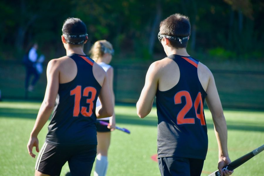Seniors Zeke Betancourt and Aiden Chitkara walk in unison during a game versus Weston on Sept. 25. Both seniors, as well as Zekes twin brother Ethan Betancourt, decided to play field hockey this year despite it being a predominantly female-played sport in the past. WSPNs Jimmy Paugh offers his perspective on their decision and the resulting backlash they have received.