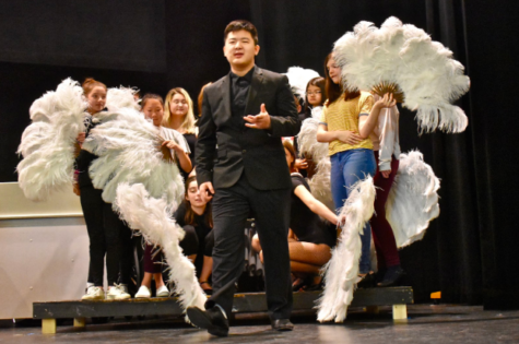Junior Kaiyang Zhang rehearses for a scene in WHSTE’s fall production of