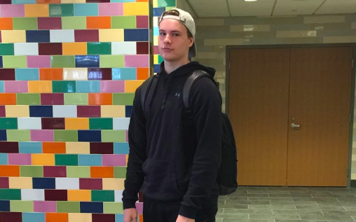 Many students at WHS find that their backpacks become increasingly heavier throughout the school year. Junior Harrison Kiesman demonstrates the ease that comes with a lighter backpack as he heads to his third block class. “I don’t think I’ve had any adverse effects thanks to a lighter backpack,” Kiesman said.